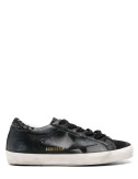 Кожаные кеды GOLDEN GOOSE Super Star GWF00101 F003463 черные с глиттером