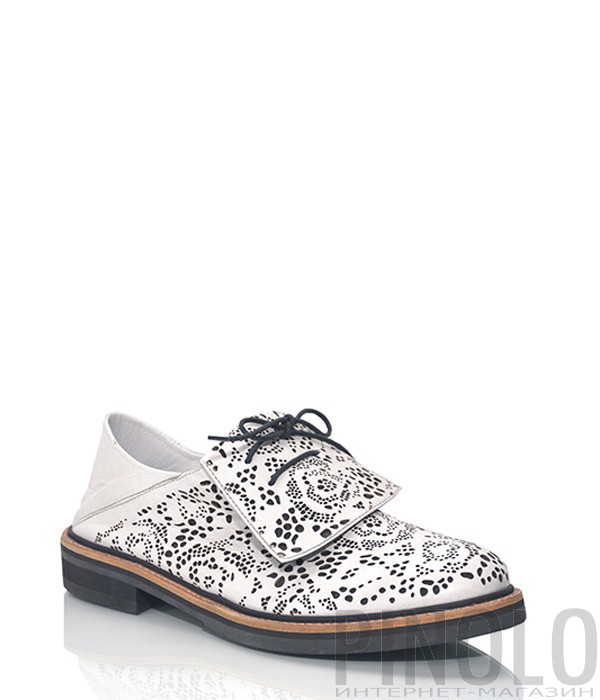 Кожаные туфли-броги Alexander McQueen с перфорацией черно-белые