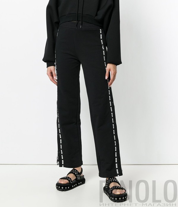 Черные женские брюки MSGM с надписями по бокам